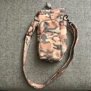 Lug Huggie crossbody bottle holder new condition never used